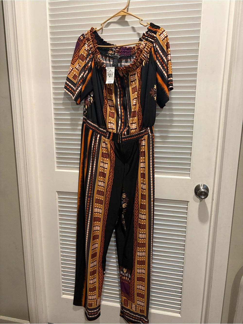 Ashley Stewart Black Jumpsuit with Gold & Purple Tribal Stripe